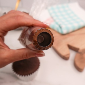 Sultan piping tip full of chocolate buttercream.