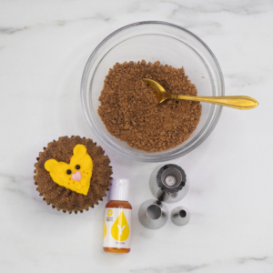 Displaying equipment used to make fuzzy lion cupcakes.