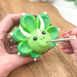 Adding nostrils and a smile with a cocktail stick. Step 10.